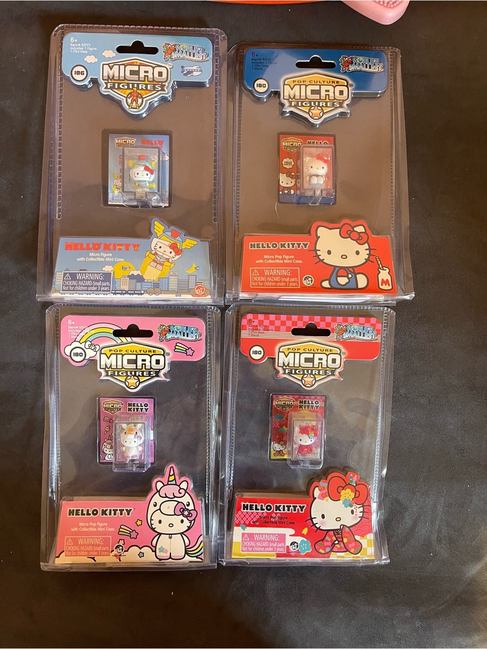 Sanrio Hello Kitty Micro Figures - Red, Pink, Blue, Yellow Accents